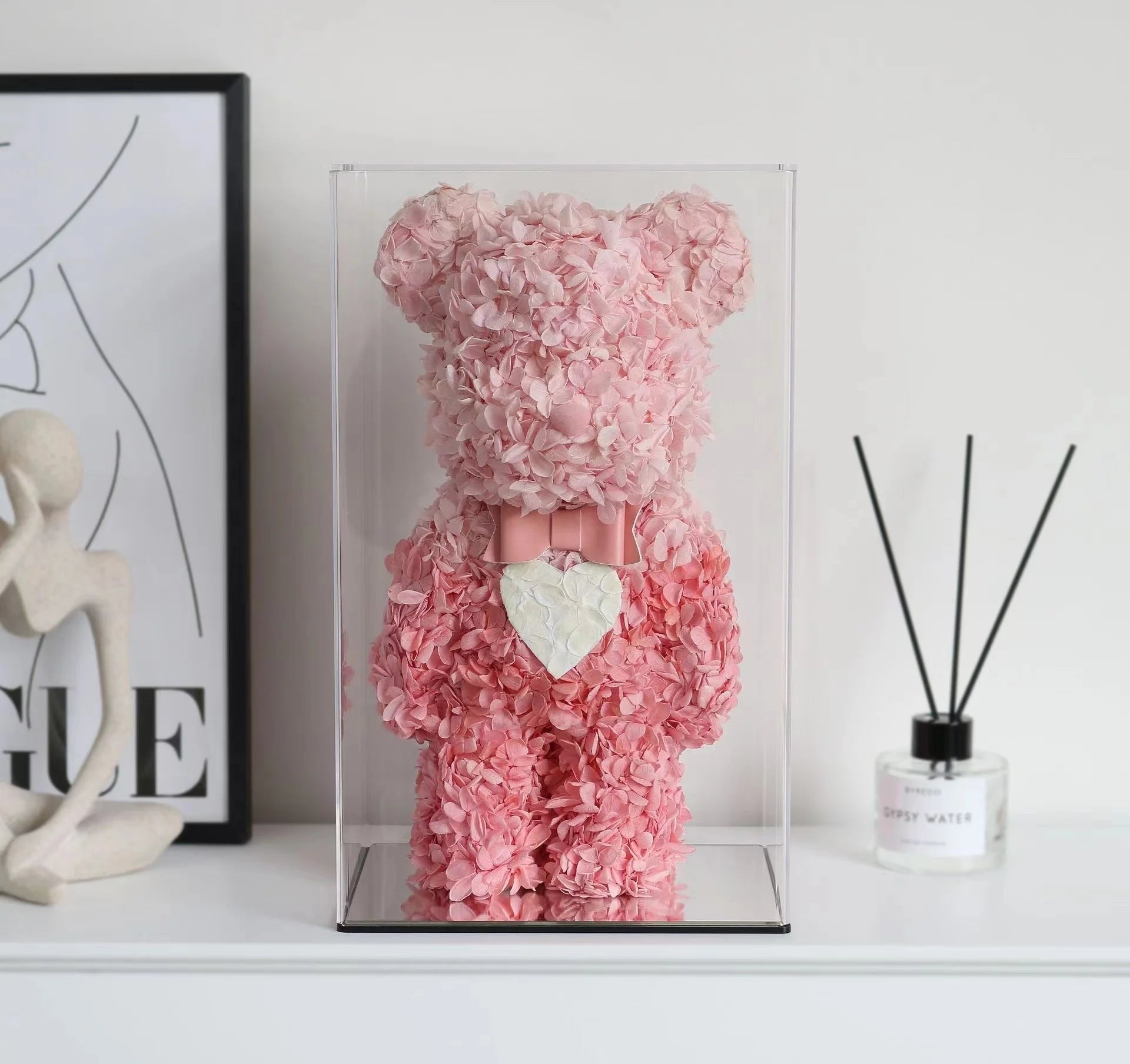 Embrace the soft elegance of our pink Bearbrick figurine, handcrafted from real Preserved Flowers. Florecise. Delicate shades of pink petals intertwine to create a charming piece that adds a touch of romance to any space.