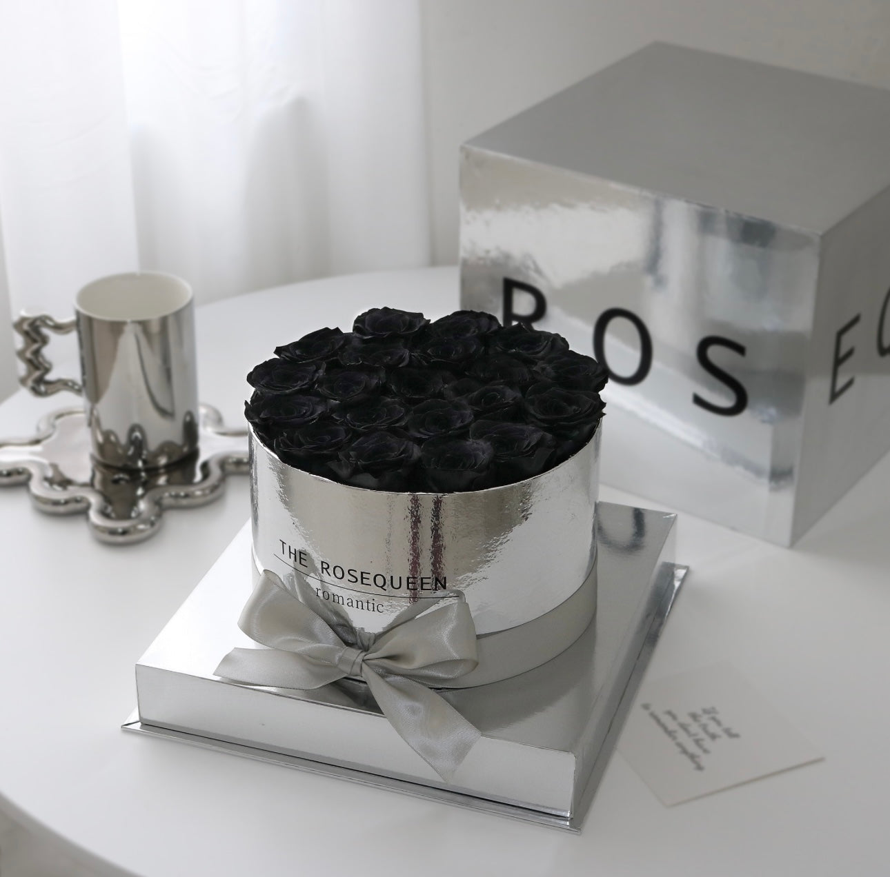 Florecise's Opulent Orb of Black Roses